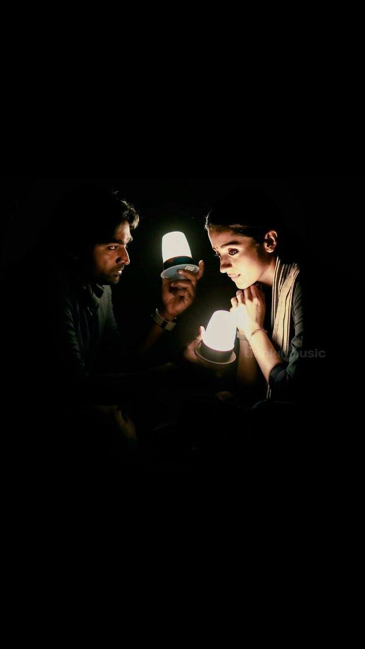 Ram and Jaanu in the dark, faces lit by a single lamp — twenty-two years collapsed into one room